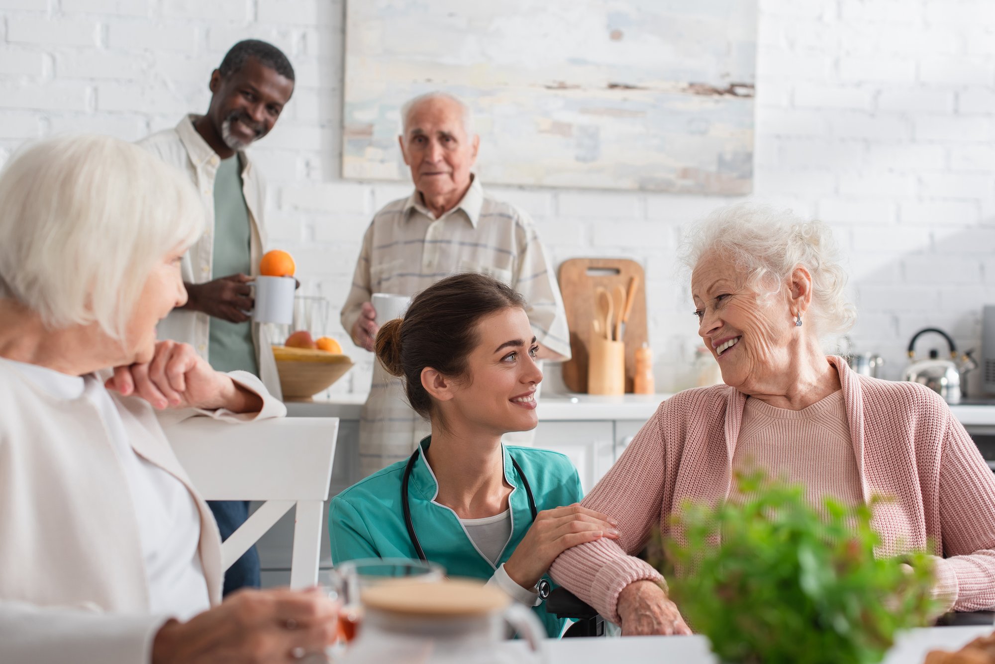caregiver_and resident_AdobeStock_471435970