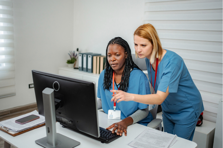 nurses at computer